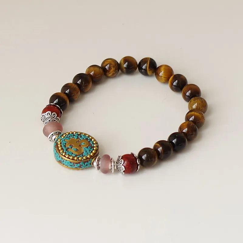Tibetisches Om- und Tigerauge-Armband