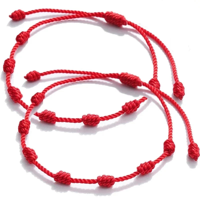 Rotes Fadenarmband 7 Knoten