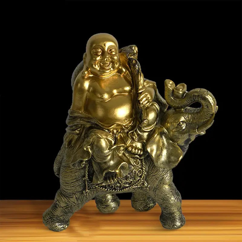 Bouddha rieur sur un éléphant