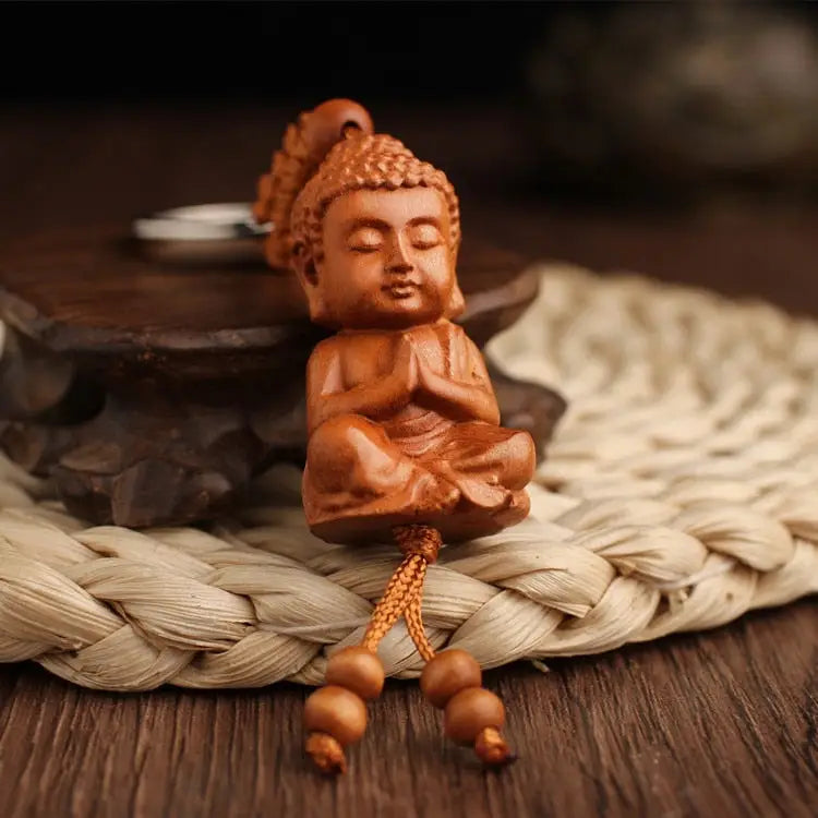 Porte-clés bouddha en bois de pêche