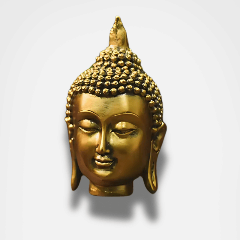 Golden Buddha head statue