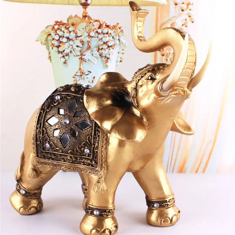 Statue d’éléphant d’Asie dorée - L 24X26 CM