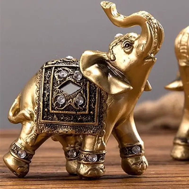 Statue d’éléphant d’Asie dorée - S 9 X 9 CM