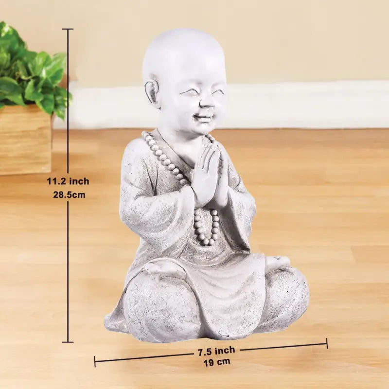 Statue petit moine en méditation